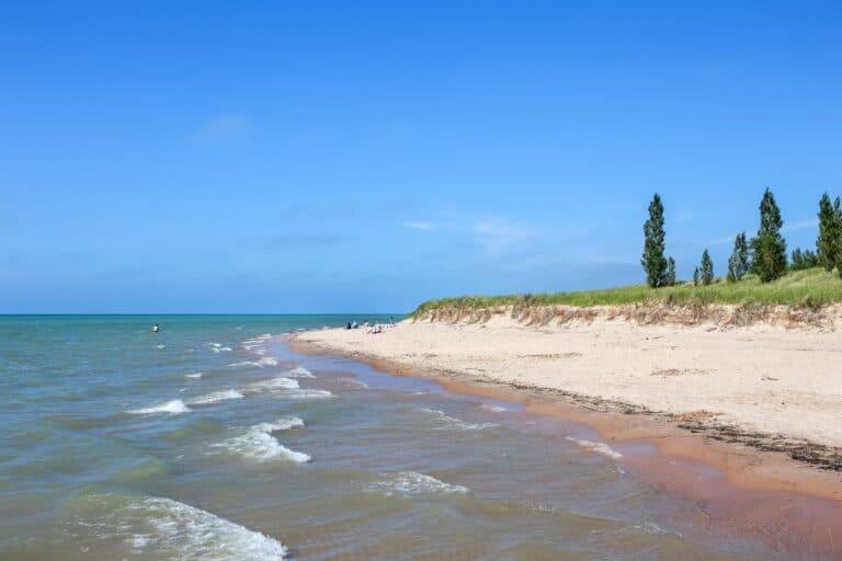 pretty beach with white sand and blue water