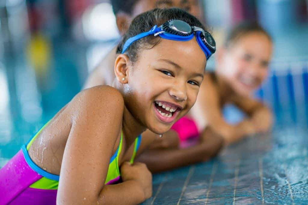 kids swimming at the holland aquatic park 