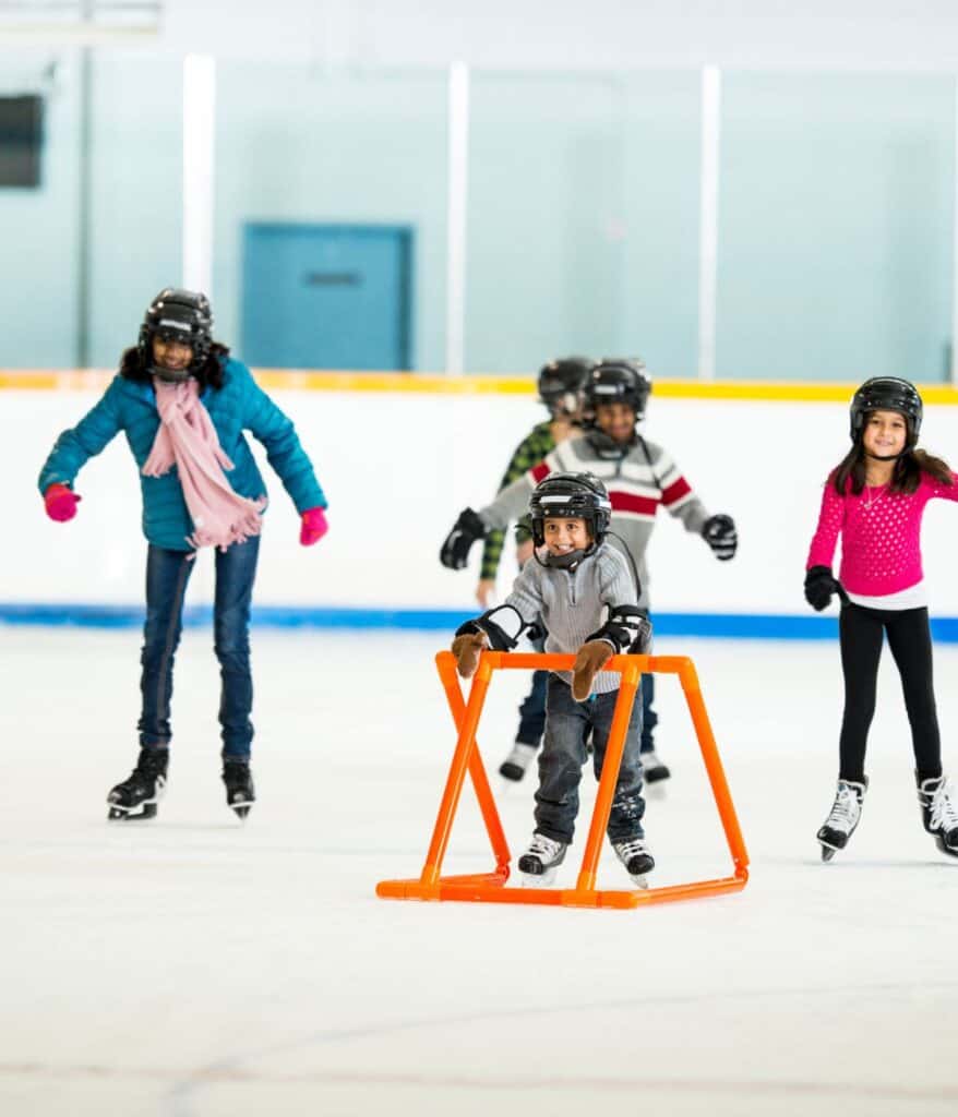 kids learning to ice skate