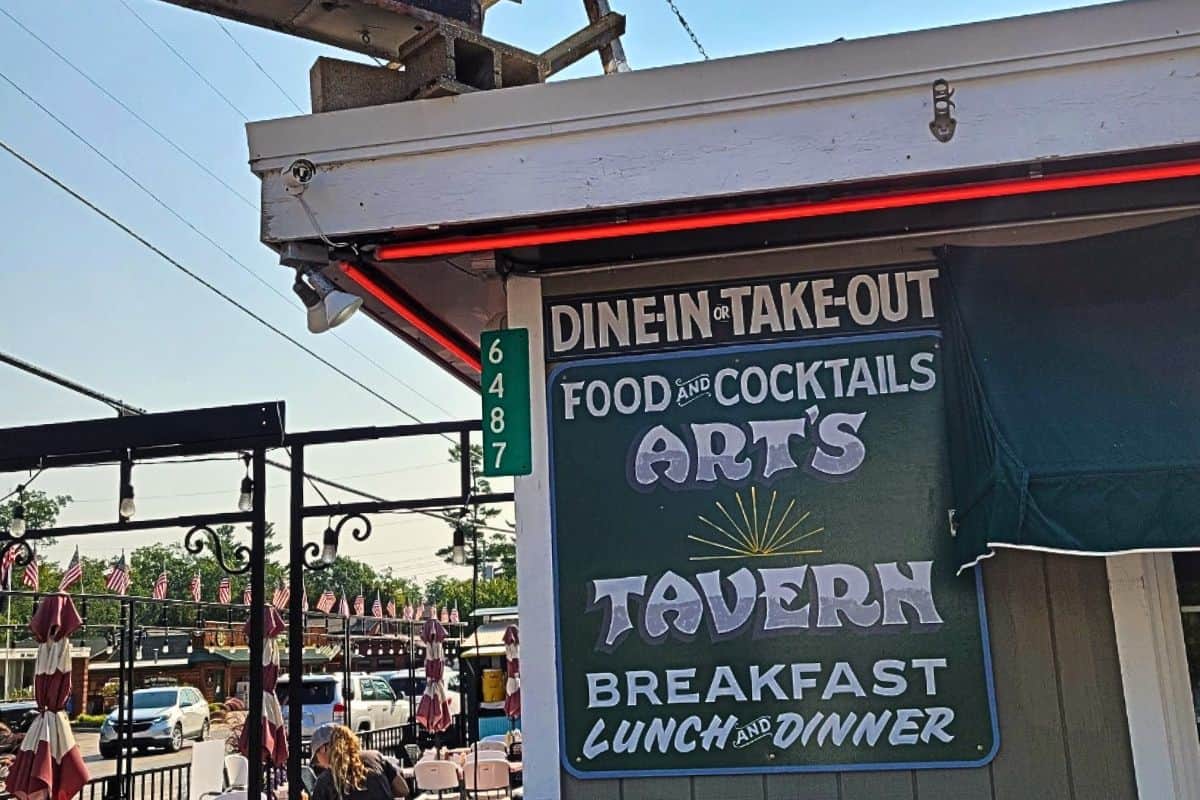 Art's Tavern hand-painted sign on the corner of M-22 in Glen Arbor Michigan since 1934