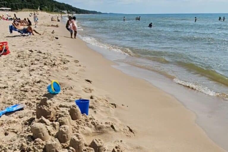 kids playing on grand haven beach