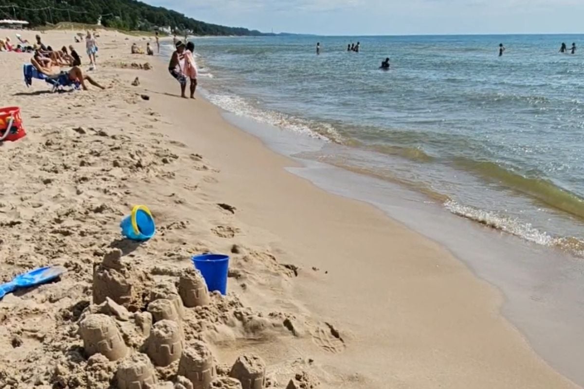 kids playing on grand haven beach