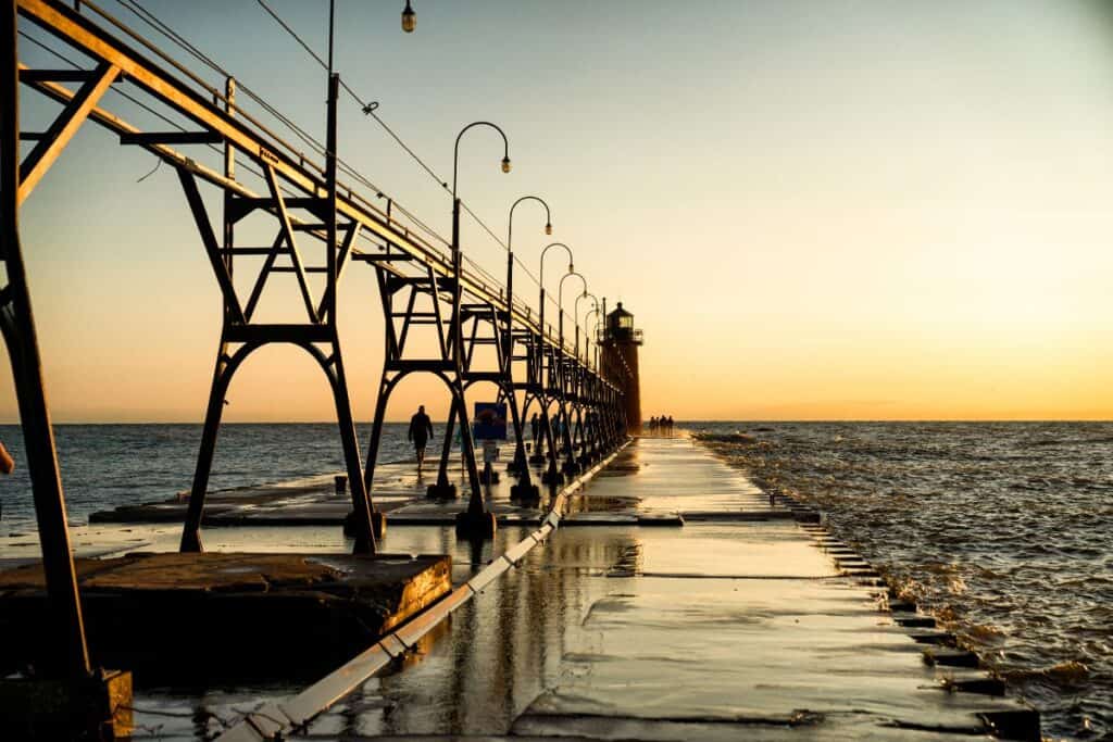 pier in muskegon michigan at sunset 