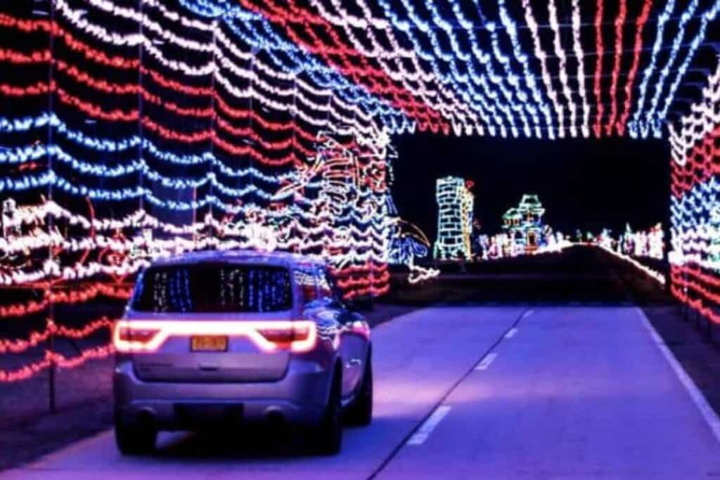 car driving through michigan christmas lights display