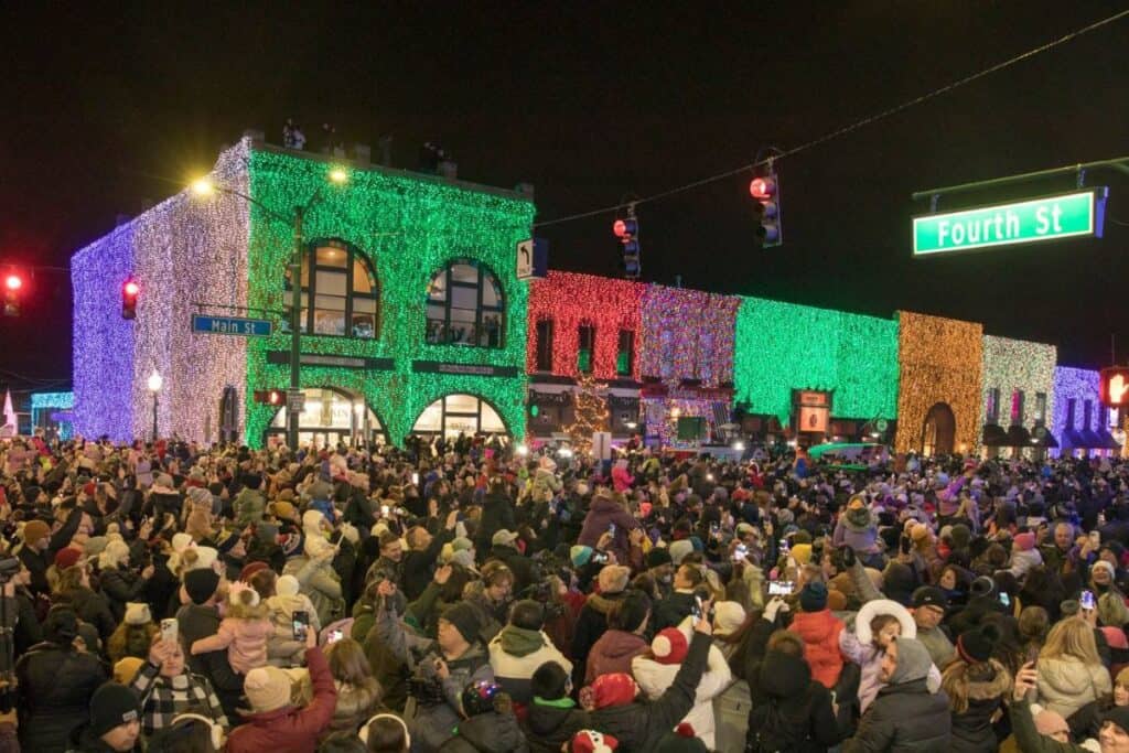crowd gathers at the rochester michigan christmas lights display