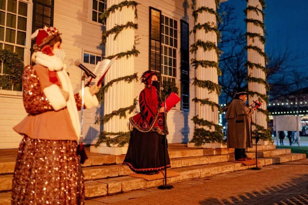carolers singing at a Christmas event at greenfield village in dearborn michigan