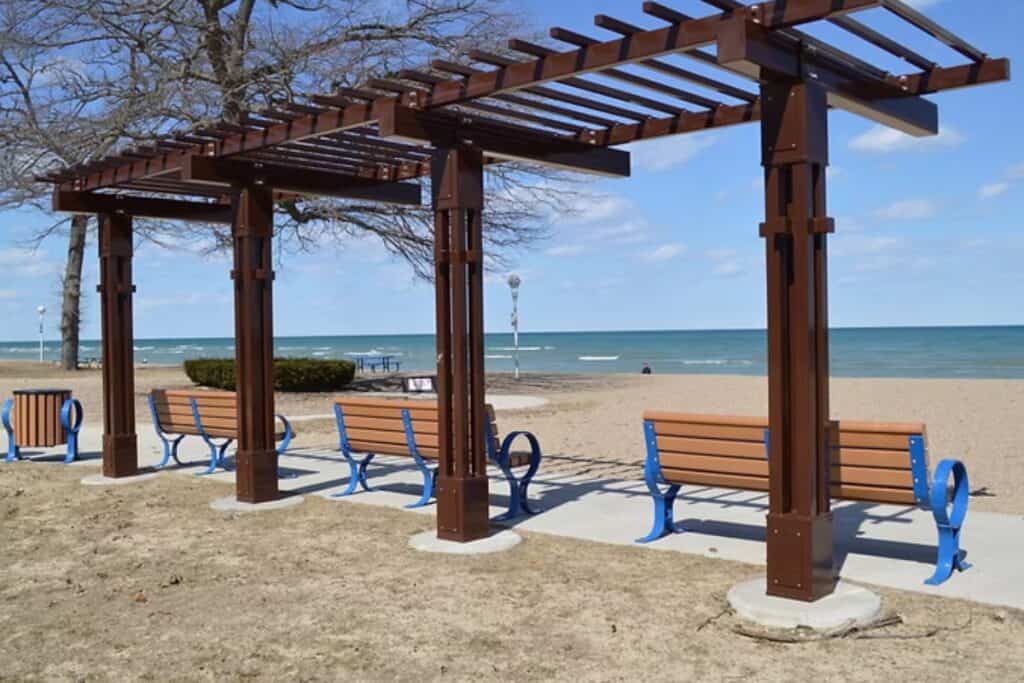 accessible pergola and benches at Lighthouse Beach Park on Lake Huron in Port Huron Michigan