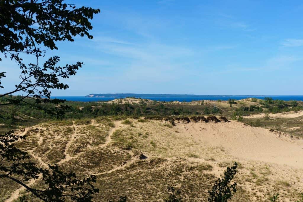 Sleeping Bear Dunes sand dune plateau with Lake Michigan and Manitou Islands visible in the distance